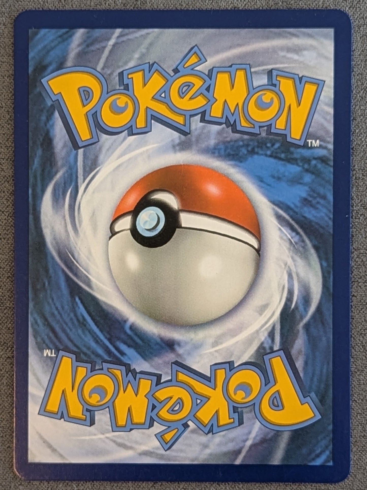 Reshiram & Charizard GX 20/214 from Unbroken Bonds (English) - Back