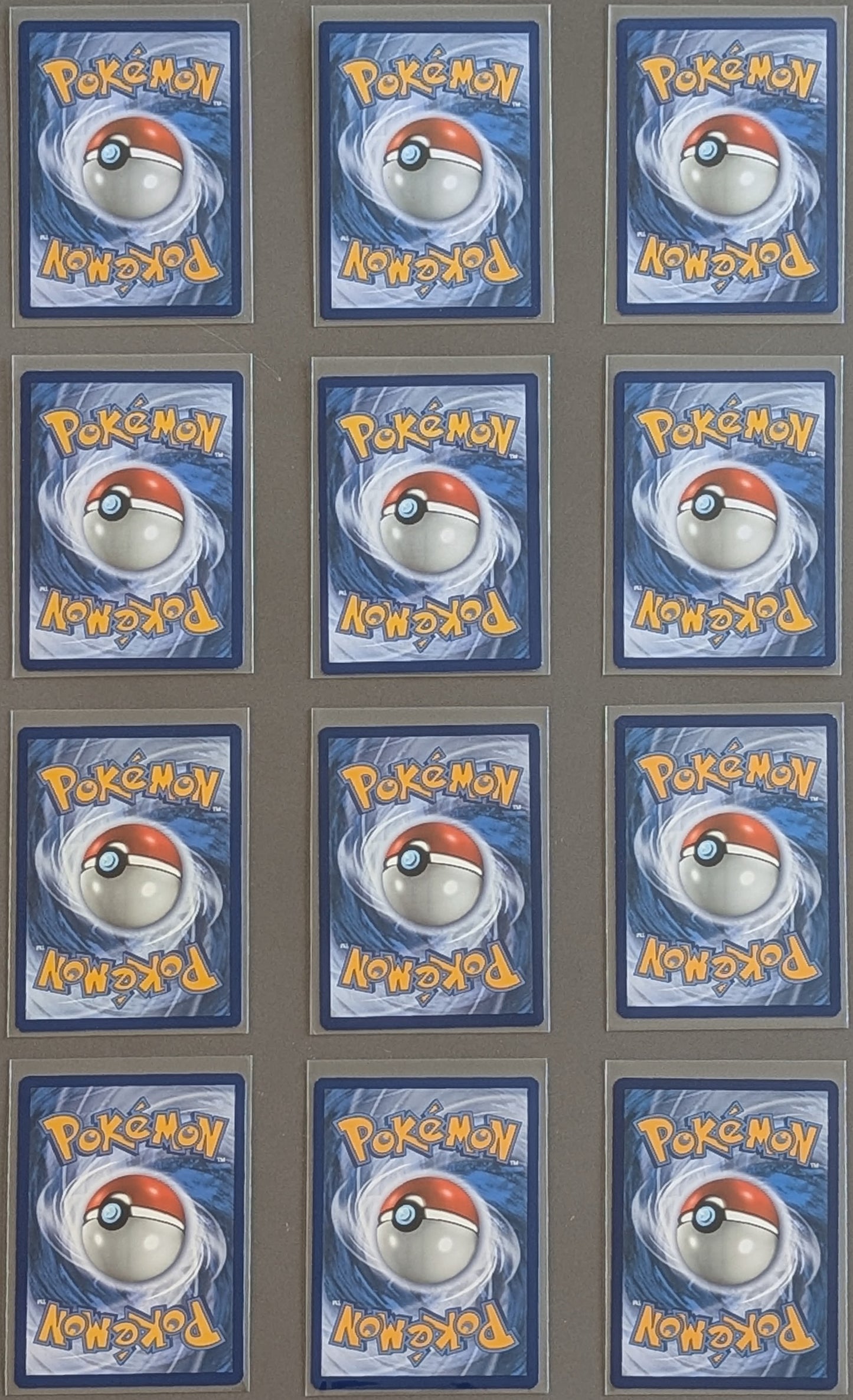 Yuka Morii Pokémon card lot featuring 12 English cards with clay artwork - Back